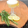 A gin cocktail using HDC Elk Rider Gin poured over ice and garnished with rosemary.