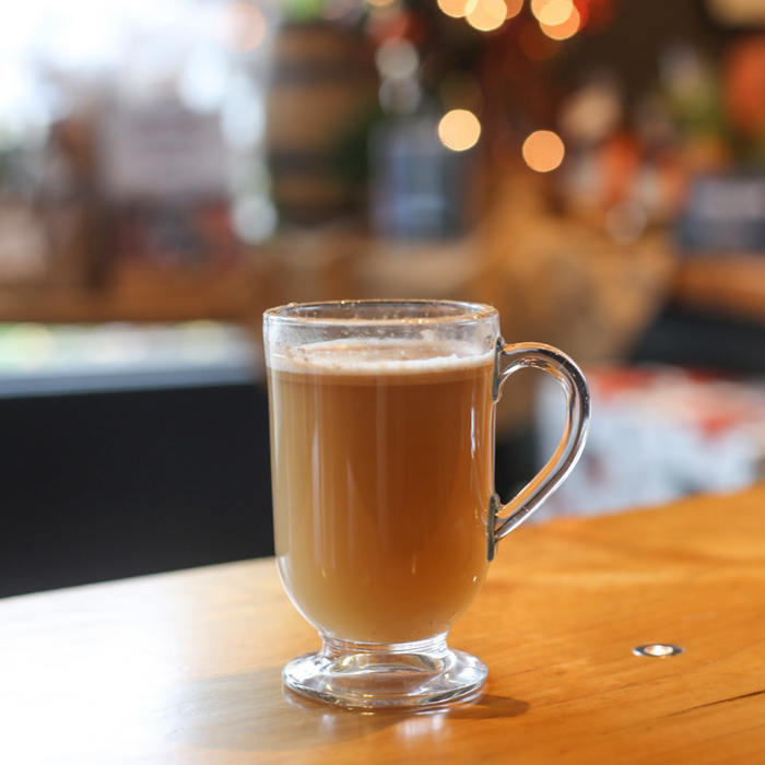 A hot cocktail in a mug using HDC Dual Barrel Bourbon (Orange) and Harvey's Hot Buttered Rum mix.