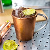 A classic mule using HDC Elk Rider Bourbon poured over ice into a copper mug.