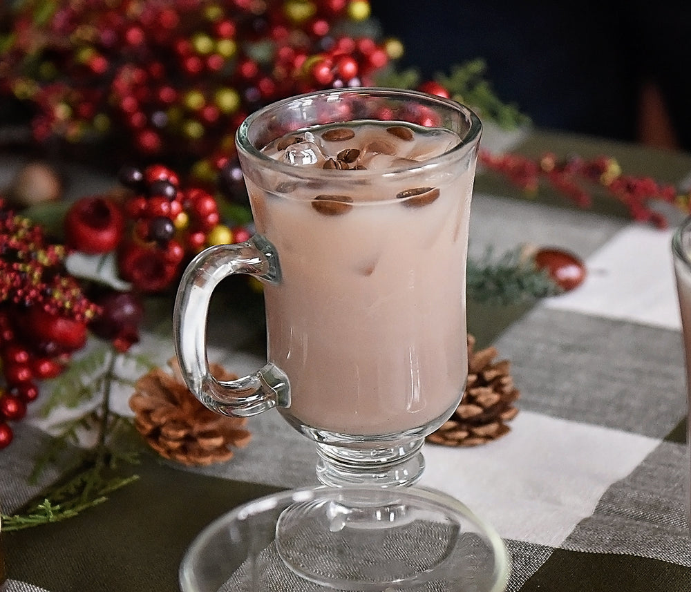 This cocktail is made possible by the popular HDC Coffee Vodka, White Crème de Cocoa, Eggnog, and coffee bean garnishes. 