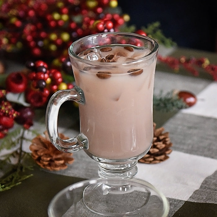 This cocktail is made possible by the popular HDC Coffee Vodka, White Crème de Cocoa, Eggnog, and coffee bean garnishes. 