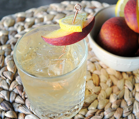 In a highball glass, this cocktail features HDC Elk Rider Bourbon and HDC Peach Vodka together. Talk about the best of both worlds! Of course, peach slices complete the drink.
