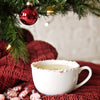 This delicious eggnog cocktail in a crushed candy cane-rimmed mug is made with HDC Vanilla Vodka and can be served hot or cold.