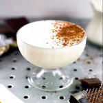This cold cocktail features the HDC Coffee vodka and is topped with shaved dark chocolate.
