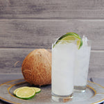An HDC Eugene favorite cocktail using HDC White Rum and garnished with a lime wedge.