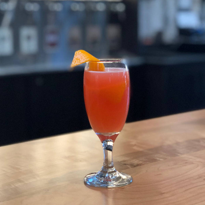 This fruity cocktail uses HDC Pomegranate Vodka and is served in a daisy goblet.