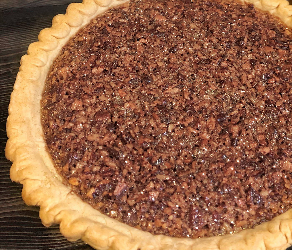 A whole Bourbon Chocolate Pecan Pie made from BSB - Brown Sugar Bourbon.