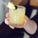 The cocktail pictured uses BSB Brown Sugar Bourbon and grilled pineapple as a twist to a classic Old Fashioned.