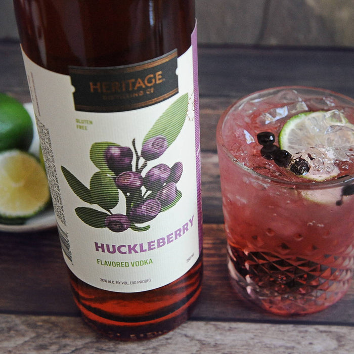 A bottle of HDC Huckleberry Vodka and a cocktail using that spirit.