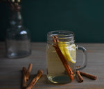 Using HDC Elk Rider Gin, this hot cocktail in a mug has nutmeg and lemon to garnish.