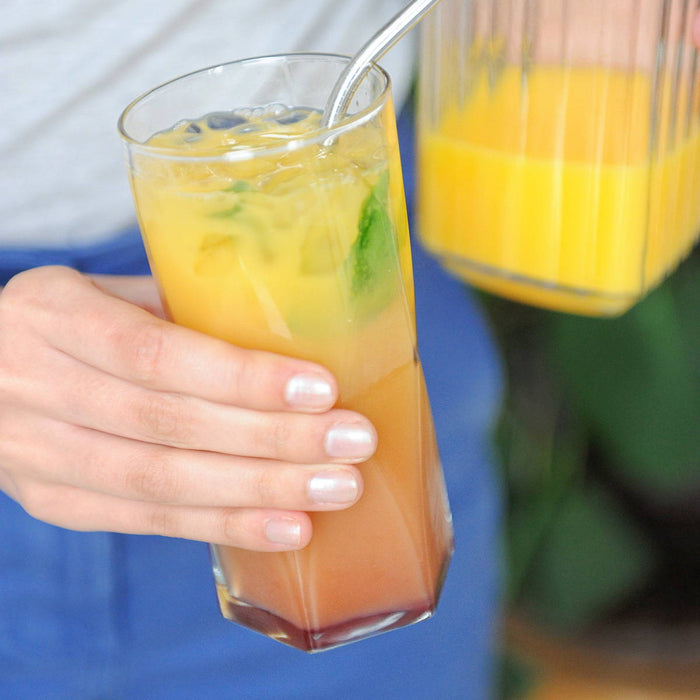 A quick and refreshing drink made with HDC Huckleberry Vodka poured over ice and topped with orange juice. Mint leaves are used for a garnish.