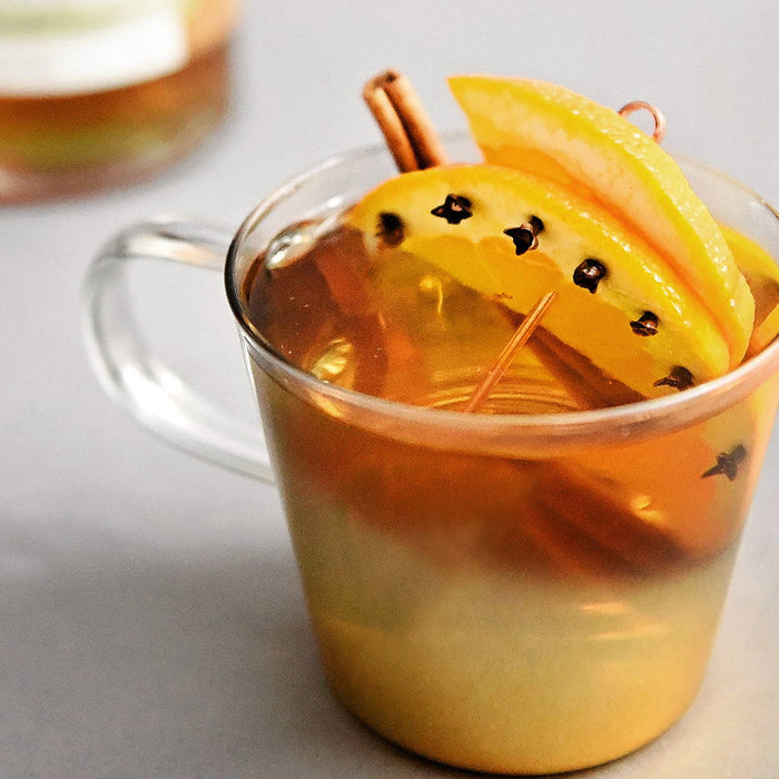 Pictured is a cocktail featuring HDC Dual Barrel Orange Rye and some fun garnishes.