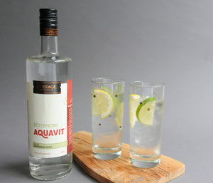 
                  
                    A 750ml bottle of HDC Bestemors Aquavit and two tall cocktails.
                  
                