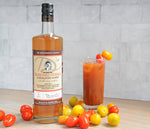 A 750ml bottle of D's "Demitri's" Seasoned Vodka.