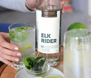 
                  
                    A 750ml bottle of HDC Elk Rider Gin and a gin and tonic cocktail.
                  
                